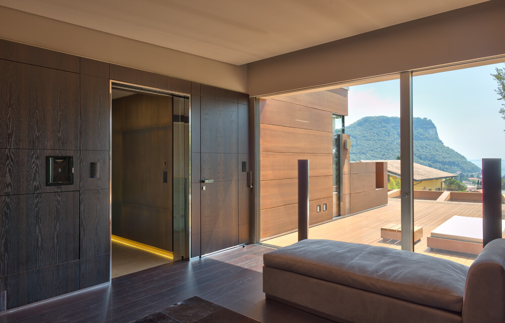 A photo of a frameless security door designed to match the wall. 