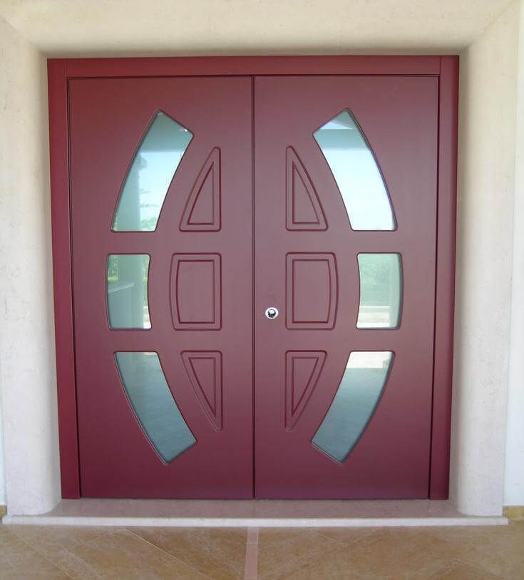 A photo of custom double security doors with frosted glass at the front entrance of a luxury home.