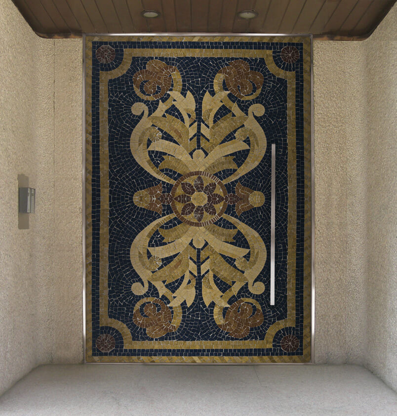 A photo of an oversized pivot door decorated in a mosaic-style. 