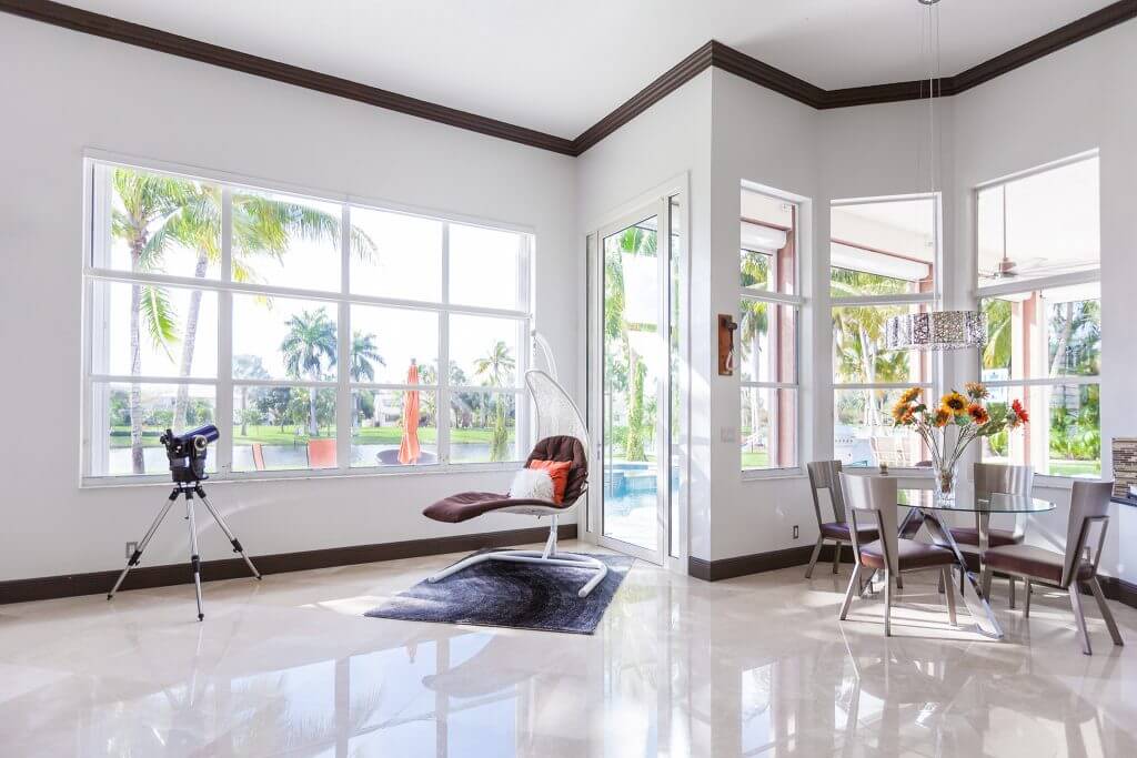 A photo of a bright living room complete with FBS windows.